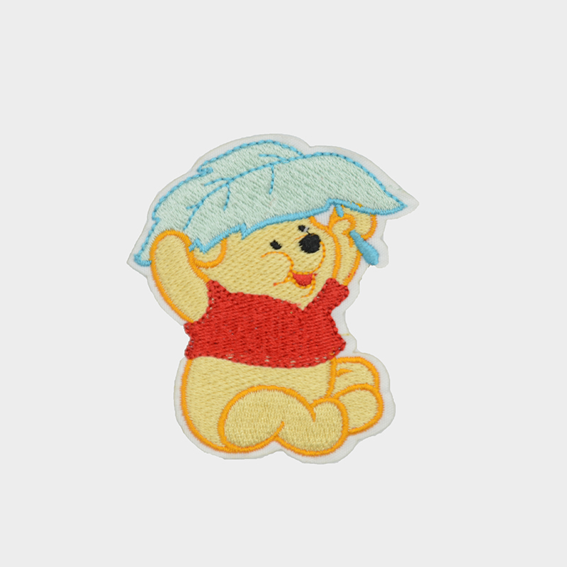 Wholesale t shirt custom badge design winnie the pooh pattern woven embroidery patch transfers